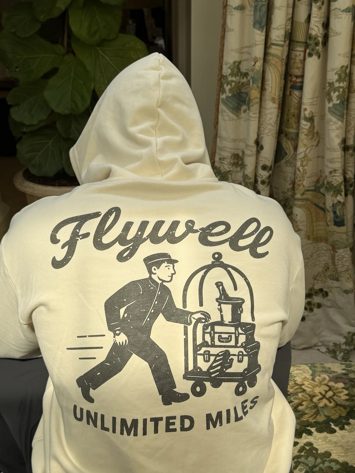 Black — The Bellhop hoodie, Unlimited Miles back print close-up